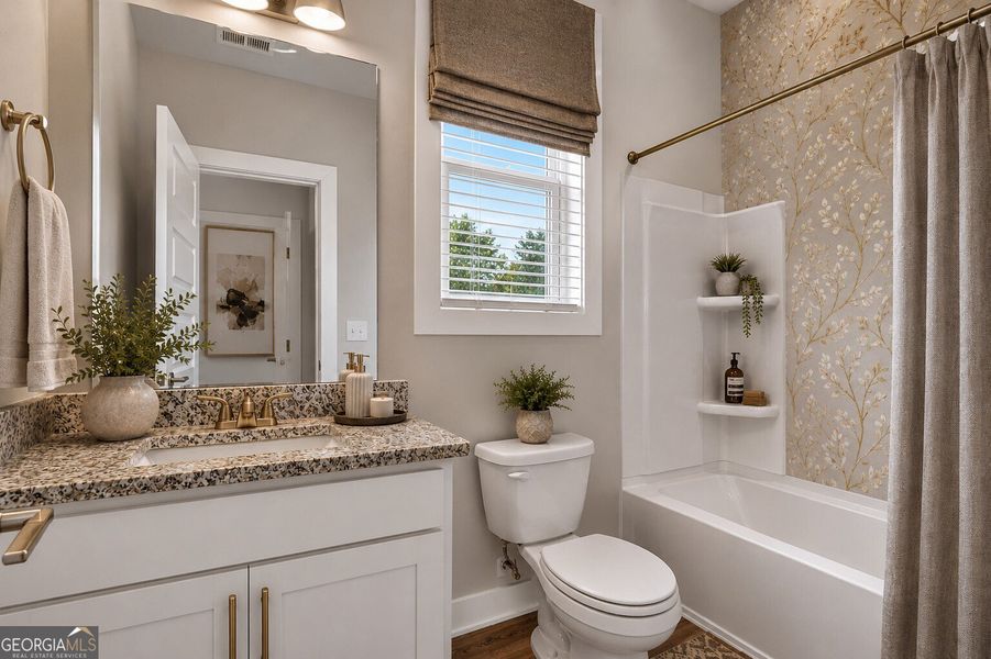 Furnished interior view inside a new home in The Fairways at Mirror Lake, Villa Rica (Image 10).