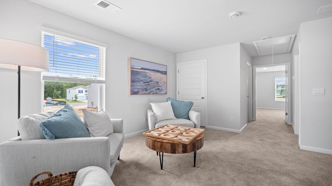 Furnished interior view inside a new home in The Lakes at North Glynn, Brunswick (Image 25).