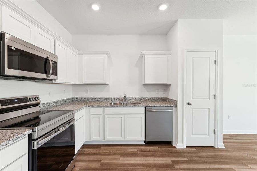 Furnished interior view inside a new home in Vista Walk, Dade City (Image 9).