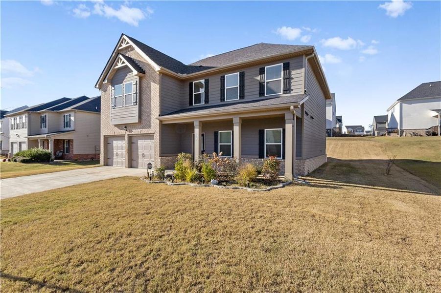 Front exterior of a new home in The Enclave at Dial Farm Phase III, Walnut Grove, GA, highlighting curb appeal (Image 17).