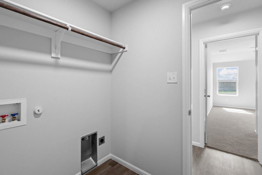 Representative furnished interior of a home built from the BELLVUE by D.R. Horton in Faculty Row, Abilene (Image 20).