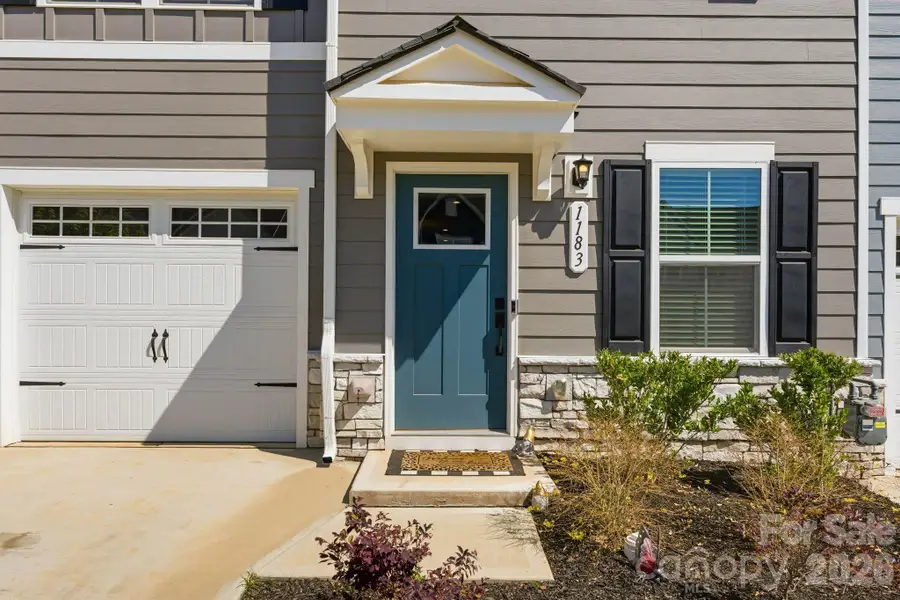 Exterior details and patio area of a home in , Troutman (Image 4).