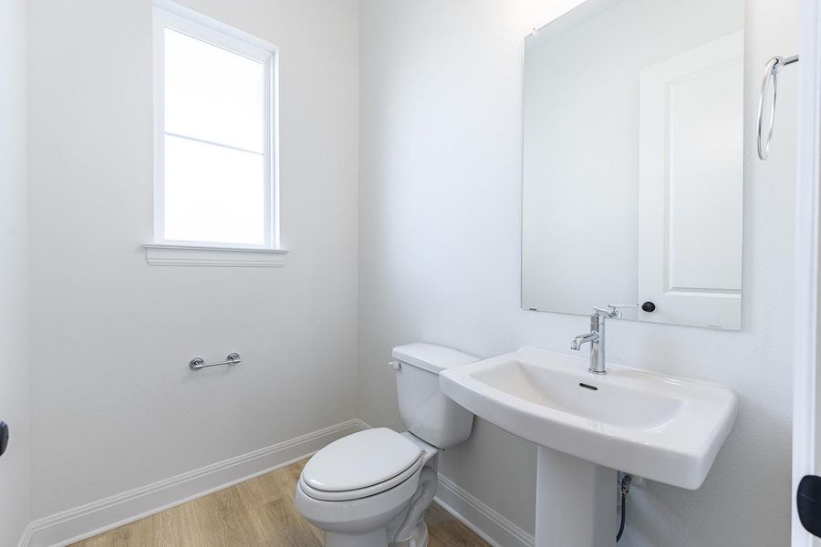 Furnished interior view inside a new home in Parmer Ranch 60, Georgetown (Image 8).