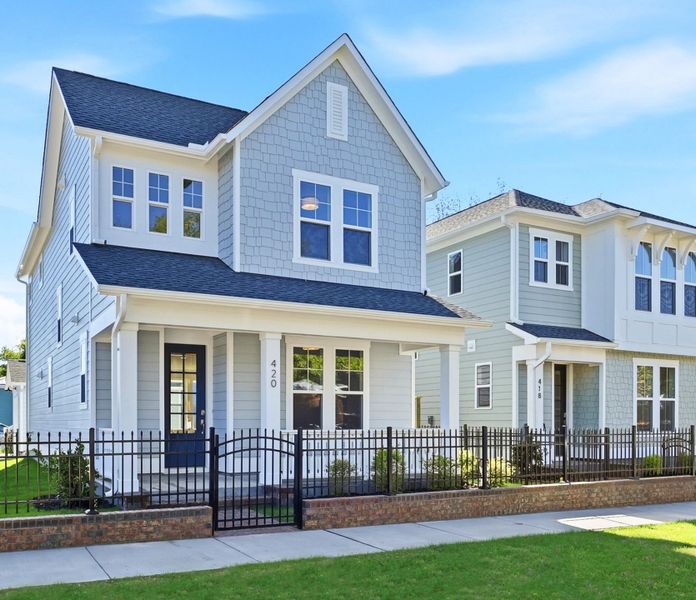 Representative exterior photo of a completed home built from the The Remington by RobuckHomes in Downtown Wilmington Collective, Wilmington, NC (Image 32). Representative exterior photo of a completed home built from the The Remington by RobuckHomes in Downtown Wilmington Collective, Wilmington, NC (Image 32).