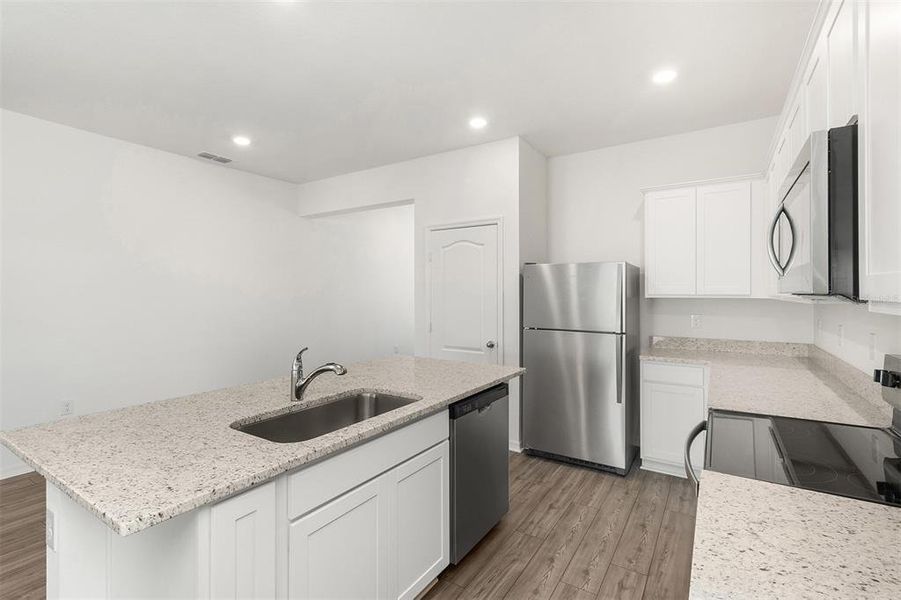 Furnished interior view inside a new home in Peach Crossings, Winter Haven (Image 4).