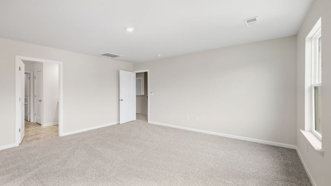 Spacious, unfurnished interior of a new home in Durbin Meadows Traditions, Fountain Inn (Image 35).