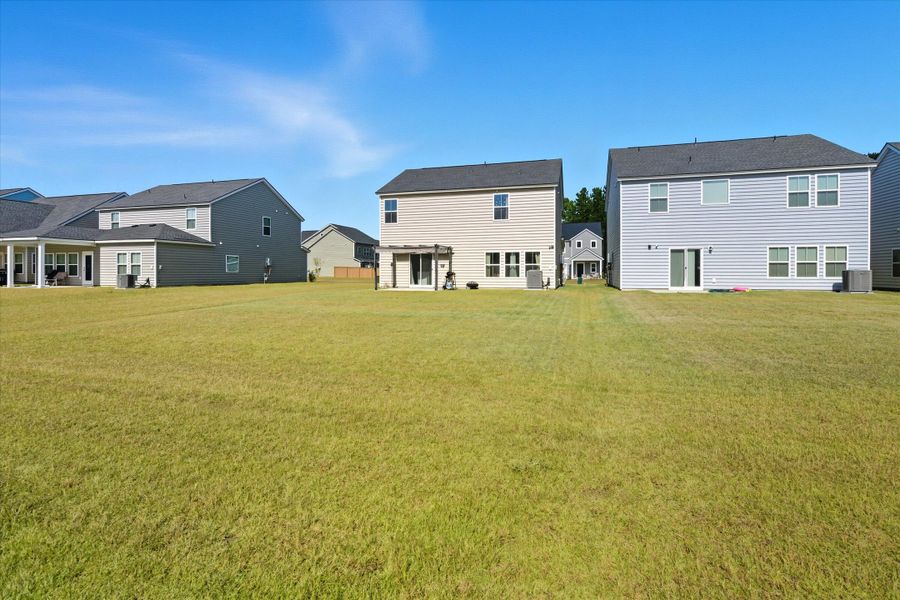 Exterior details and patio area of a home in Heron's Walk at Summers Corner: Carolina Collection, Summerville (Image 1). Exterior details and patio area of a home in Heron's Walk at Summers Corner: Carolina Collection, Summerville (Image 1).