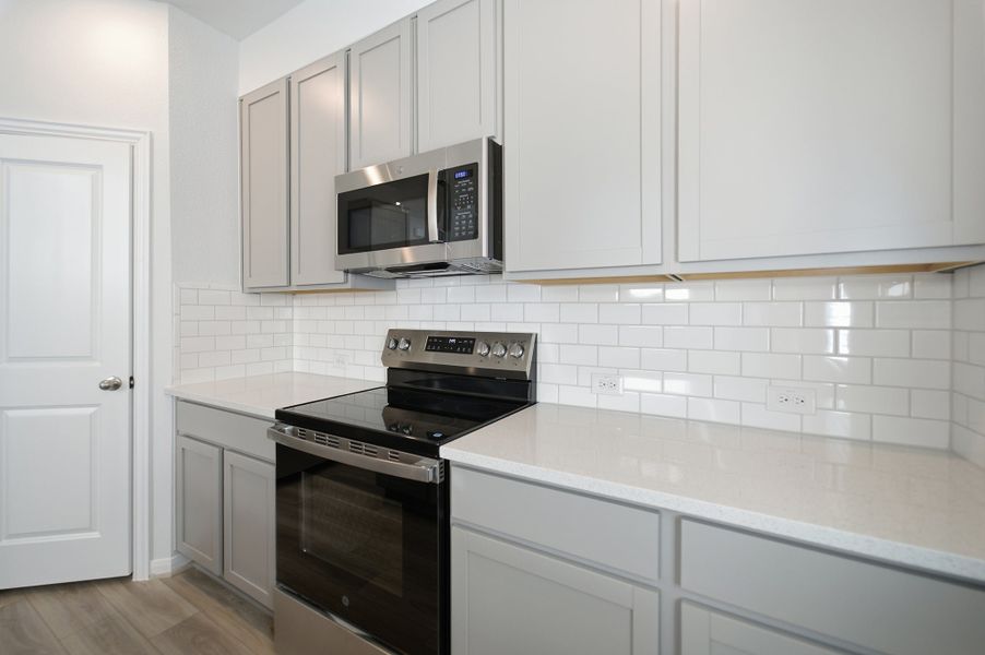 Furnished interior view inside a new home in Municipal Drive Townhomes, Leander (Image 8).