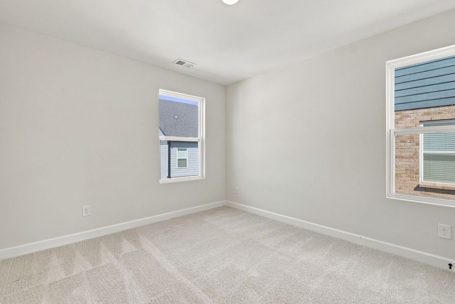 Light Filled Third Bedroom in the Grayson