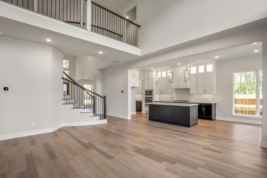 Furnished interior view inside a new home in ARTAVIA, Conroe (Image 14).
