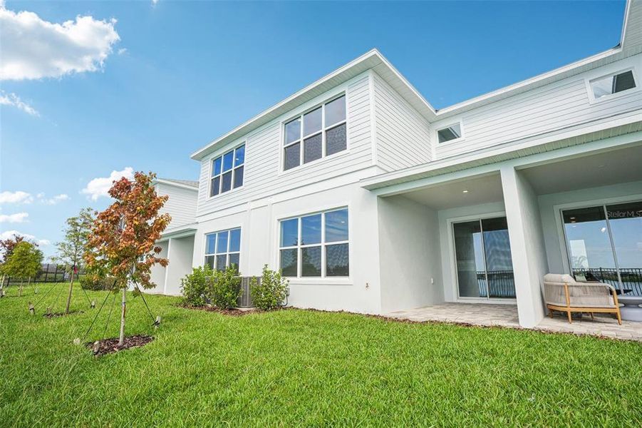 Front exterior of a new home in Isla Mirada, San Antonio, FL, highlighting curb appeal (Image 2).