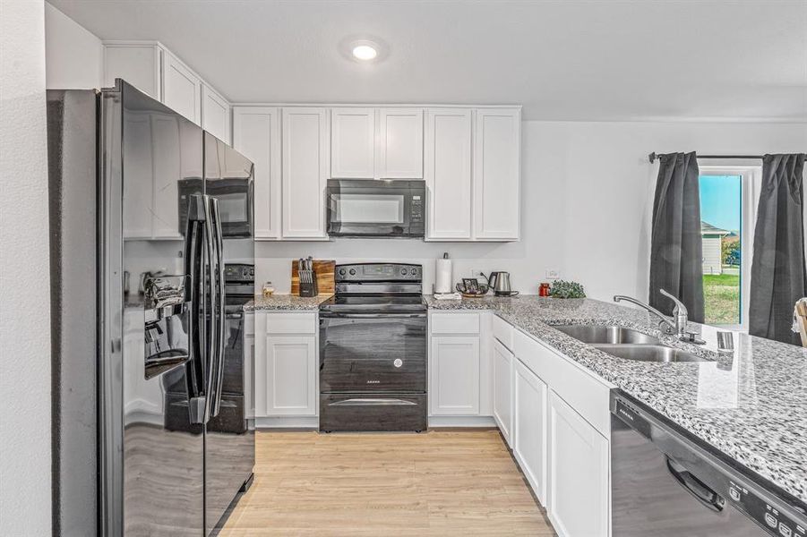 Furnished interior view inside a new home in South Oak Grove: Cottage Collection, Fort Worth (Image 11). Furnished interior view inside a new home in South Oak Grove: Cottage Collection, Fort Worth (Image 11).