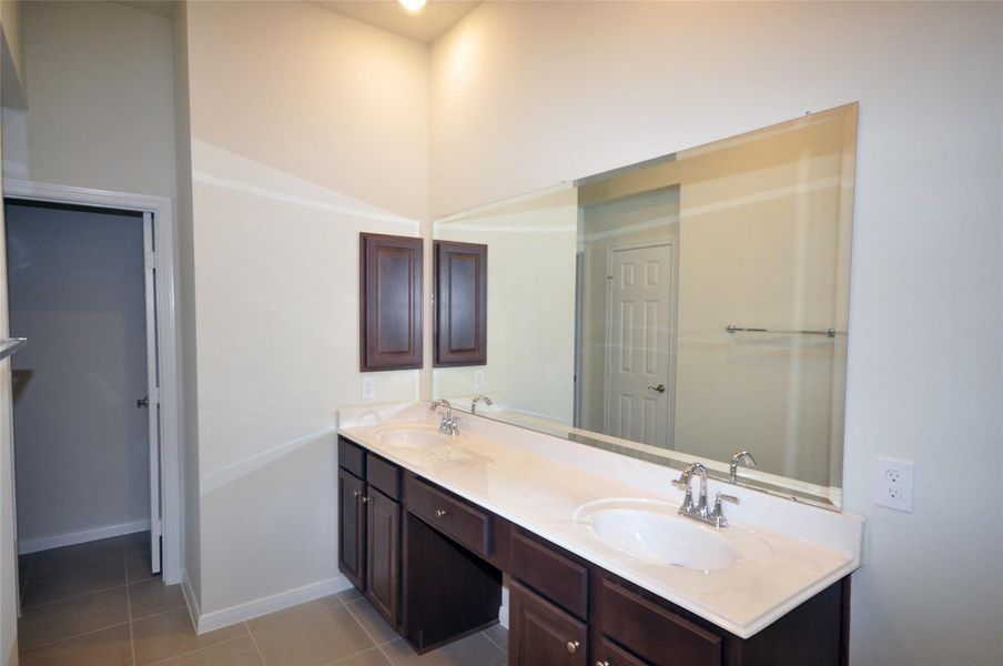 Double Vanities in the master bath.And medicine cabinets are standard in Cervelle Homes.