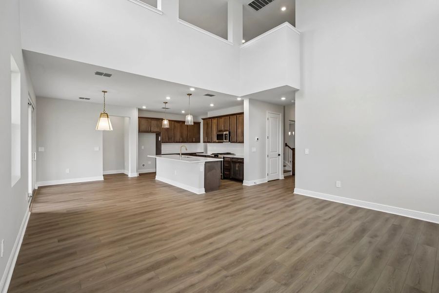 This open concept living, dining and kitchen space is the perfect space for entertaining