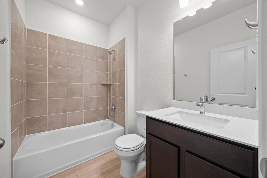 Furnished interior view inside a new home in Salerno - Classic Collection, Round Rock (Image 9). Furnished interior view inside a new home in Salerno - Classic Collection, Round Rock (Image 9).