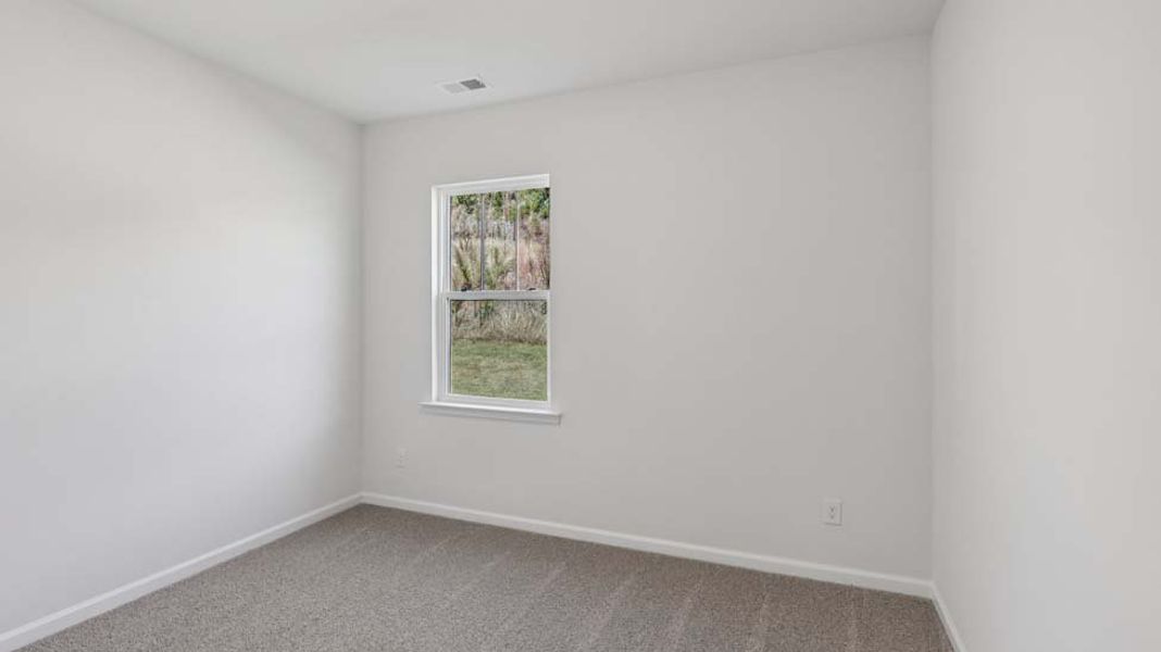 Spacious, unfurnished interior of a new home in Rydele Heights, Asheville (Image 32).