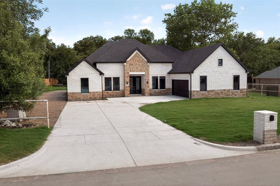 Front exterior of a new home in , Fort Worth, TX, highlighting curb appeal (Image 26).