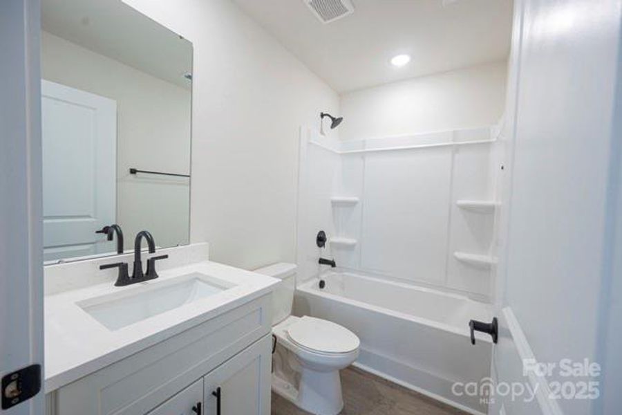 Furnished interior view inside a new home in , Newton (Image 8).