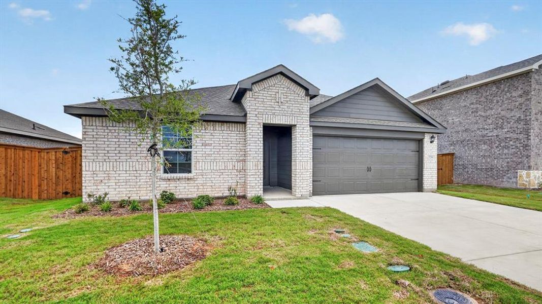Front exterior of a new home in Forestbrook Estates, Paris, TX, highlighting curb appeal (Image 23).