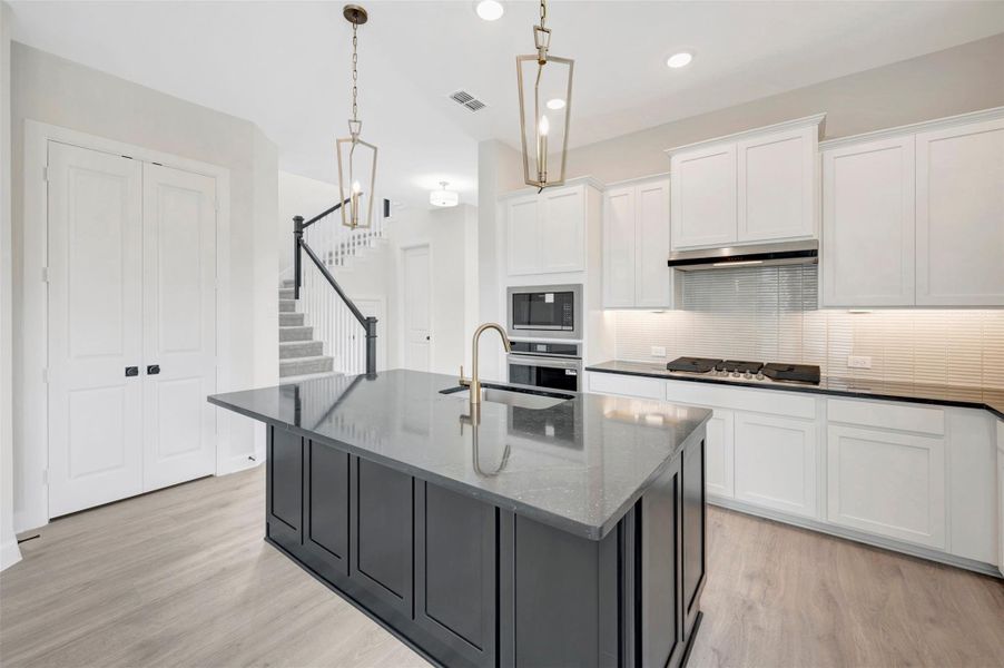 Furnished interior view inside a new home in Pomona - Grove Row Collection, Manvel (Image 9).