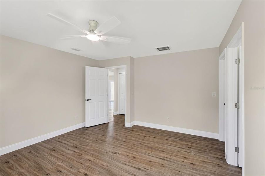 Spacious, unfurnished interior of a new home in , Port Charlotte (Image 24).