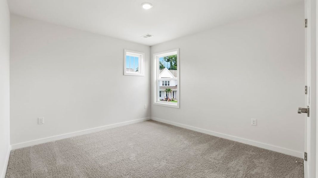 Spacious, unfurnished interior of a new home in Adams Glen, Greenville (Image 40). Spacious, unfurnished interior of a new home in Adams Glen, Greenville (Image 40).