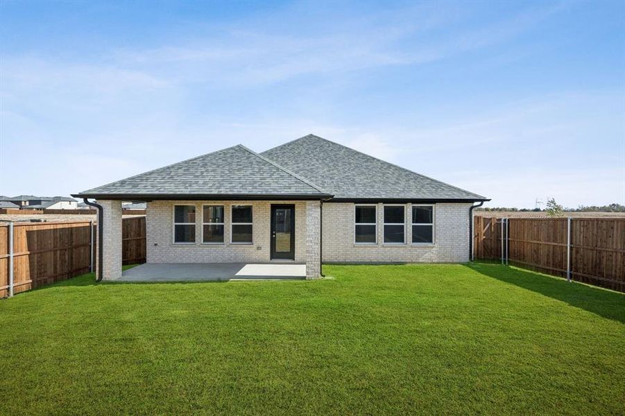 Exterior details and patio area of a home in Santorini, Seagoville (Image 3).