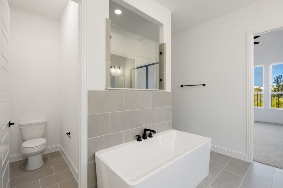 Furnished interior view inside a new home in Cambridge Crossing, Celina (Image 11).