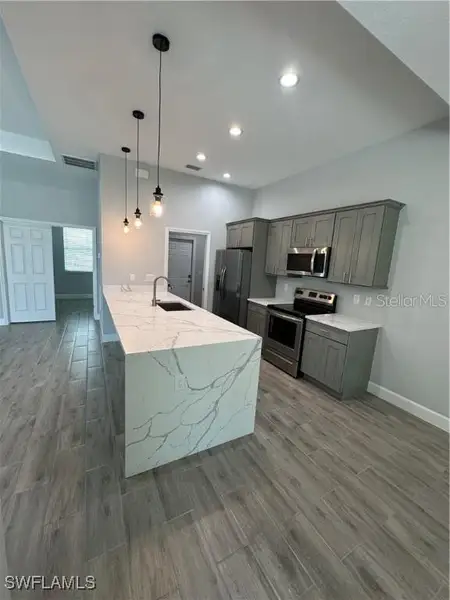 Furnished interior view inside a new home in , Cape Coral (Image 4).