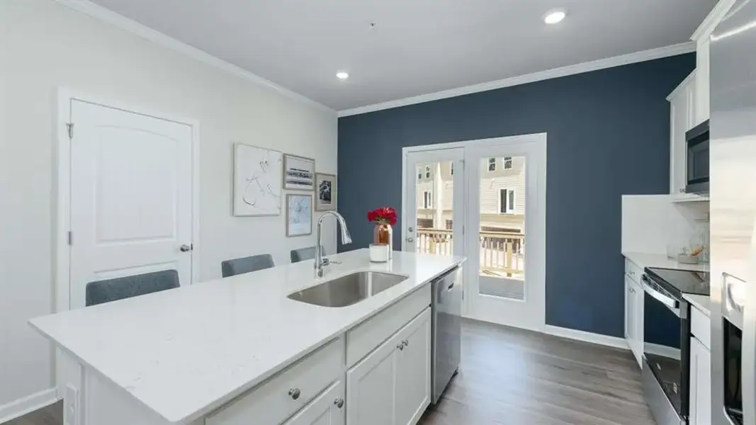 Furnished interior view inside a new home in Townes at Asbury, Hapeville (Image 14). Furnished interior view inside a new home in Townes at Asbury, Hapeville (Image 14).