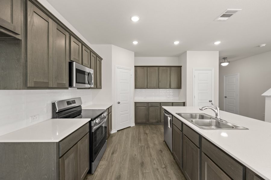 Furnished interior view inside a new home in Eagle Cove, Denton (Image 11).
