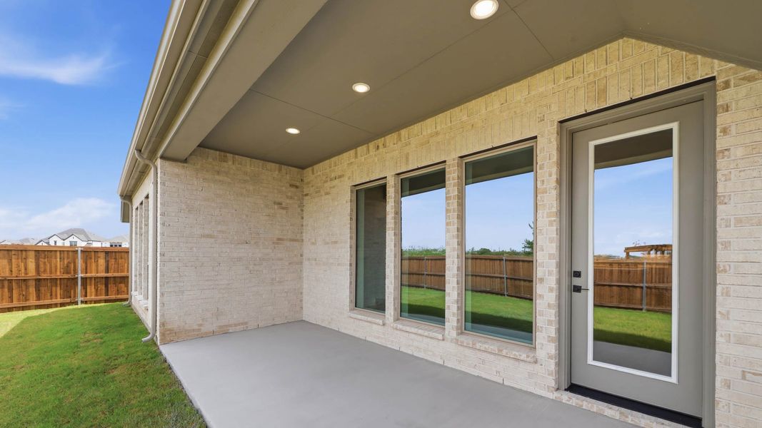Exterior details and patio area of a home in Lakewood Village, Lakewood Village (Image 4).