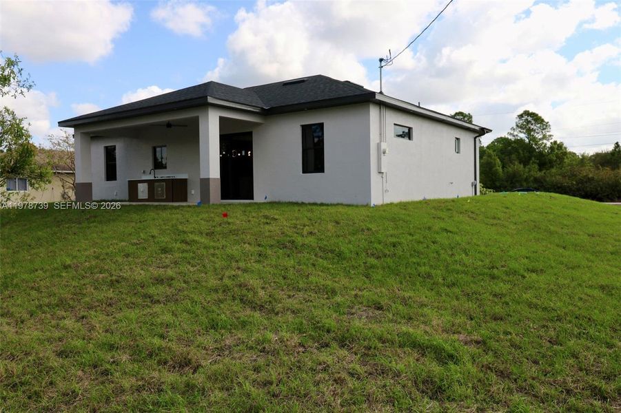 Exterior details and patio area of a home in , Lehigh Acres (Image 32).