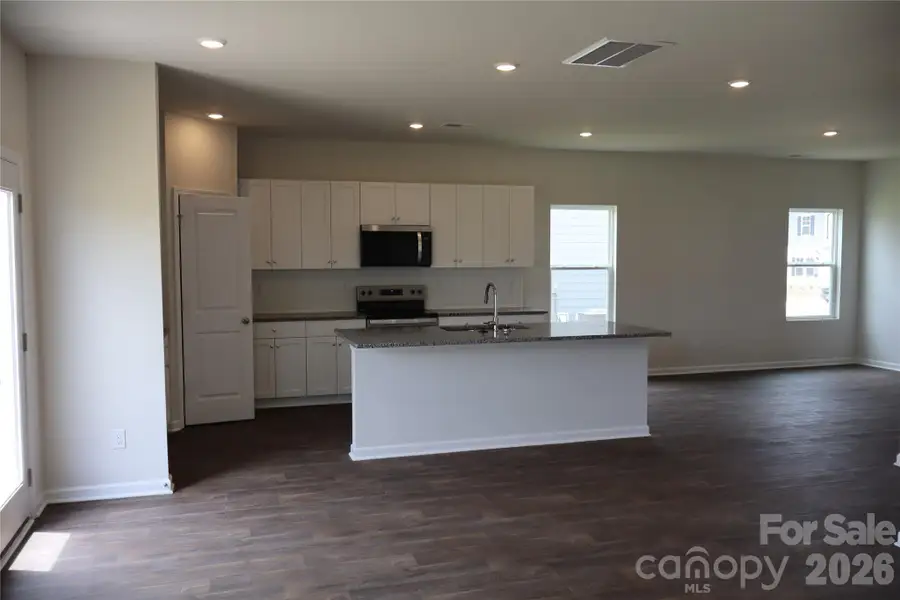 white cabinets with soft close doors.