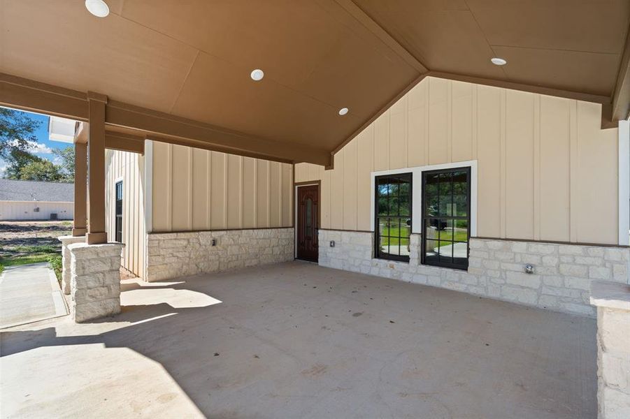 High, vaulted carport ceilings with recessed lighting