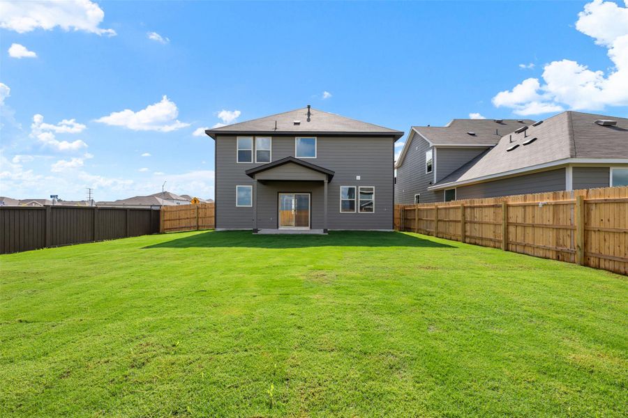 Exterior details and patio area of a home in Rolling Glen, Hutto (Image 22).