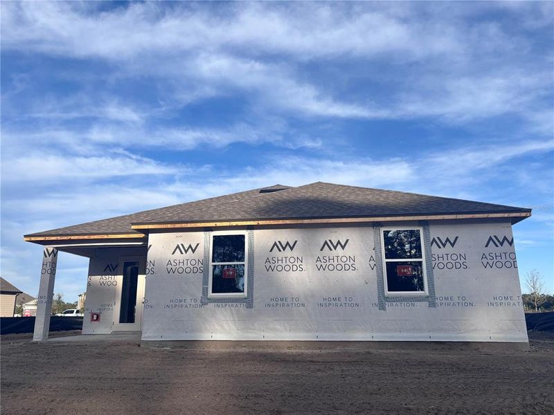 Exterior details and patio area of a home in Ardisia Park Traditional, New Smyrna Beach (Image 2). Exterior details and patio area of a home in Ardisia Park Traditional, New Smyrna Beach (Image 2).