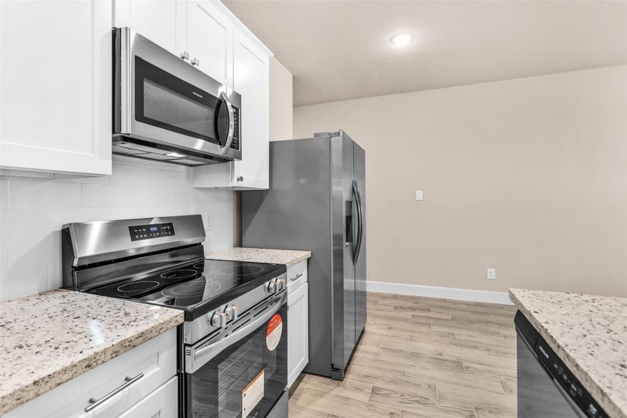 Furnished interior view inside a new home in , Willis (Image 13).