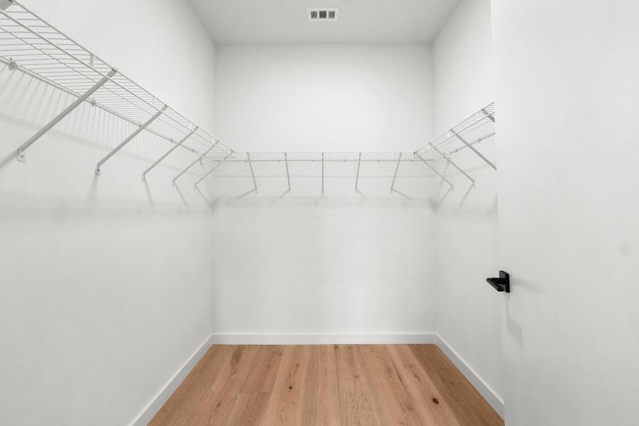 Furnished interior view inside a new home in One Oak, Austin (Image 6).