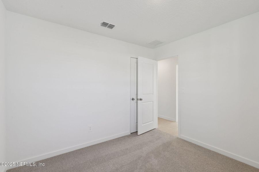 Spacious, unfurnished interior of a new home in Flagler Village - Classic Series, Palm Coast (Image 23).