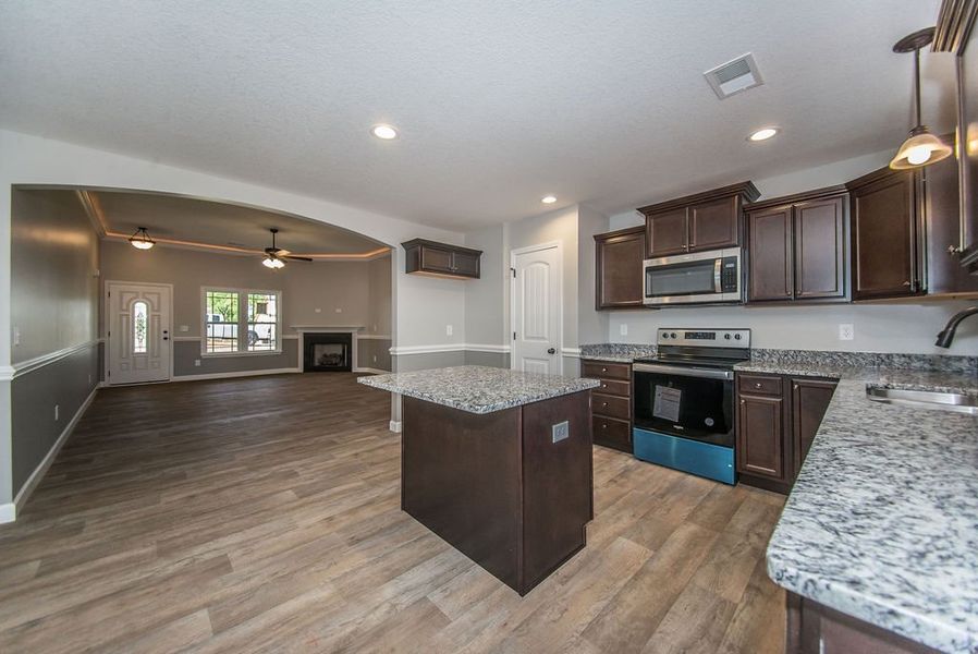 Representative furnished interior of a home built from the Archer by Enchanted Homes in Lonesome Dove, San Antonio (Image 14).