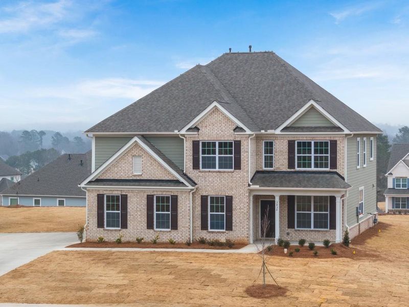 Front exterior of a new home in Haven Abbey, Cumming, GA, highlighting curb appeal (Image 39). Front exterior of a new home in Haven Abbey, Cumming, GA, highlighting curb appeal (Image 39).