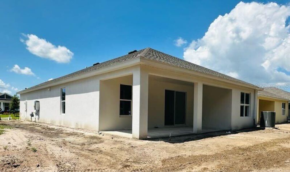 Front exterior of a new home in Cascades at Southern Hills, Brooksville, FL, highlighting curb appeal (Image 26). Front exterior of a new home in Cascades at Southern Hills, Brooksville, FL, highlighting curb appeal (Image 26).