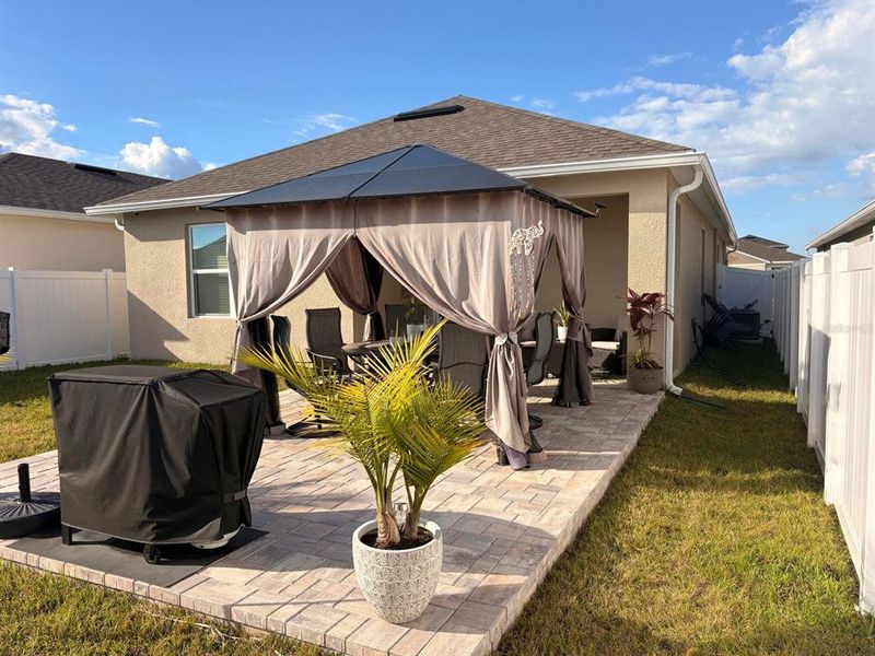Exterior details and patio area of a home in Kindred, Kissimmee (Image 3).