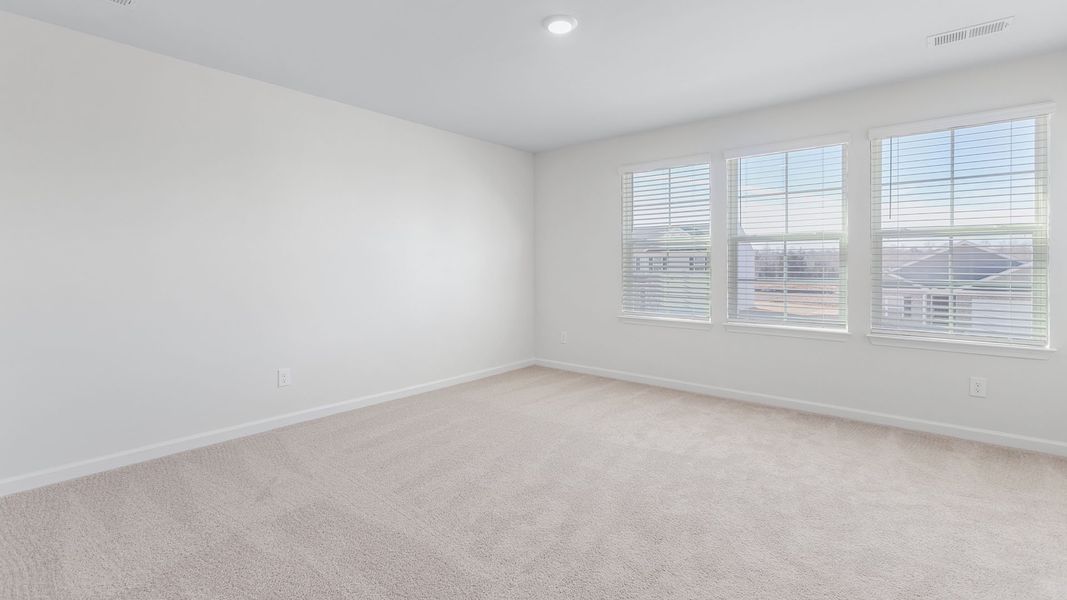 Spacious, unfurnished interior of a new home in English Farm, Archdale (Image 27).