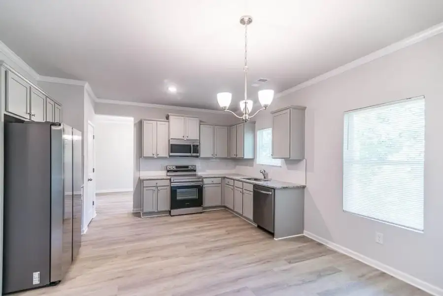 Furnished interior view inside a new home in , Douglasville (Image 3).