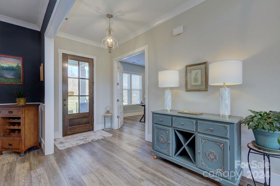 View from dining area to foyer/entryway