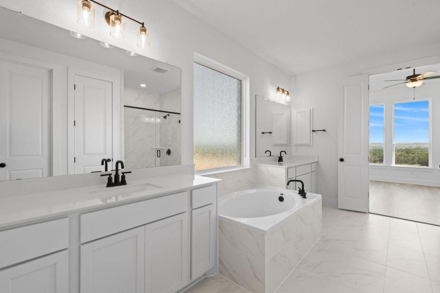 Primary Bath retreat with dual vanities & garden tub