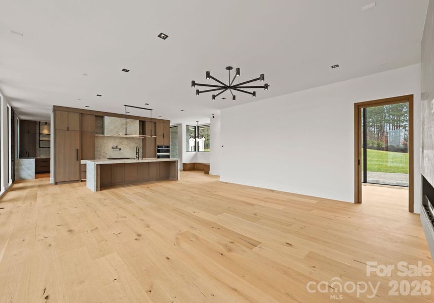 Open-concept main living area including the living room and kicthen. Open-concept main living area including the living room and kicthen.