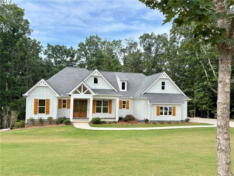 Front exterior of a new home in , Ball Ground, GA, highlighting curb appeal (Image 2). Front exterior of a new home in , Ball Ground, GA, highlighting curb appeal (Image 2).